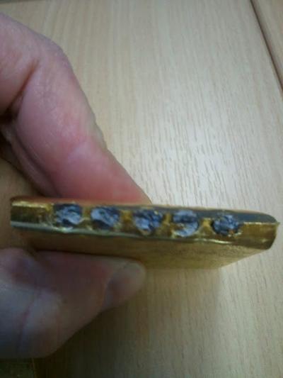 Fake gold filled with tungsten