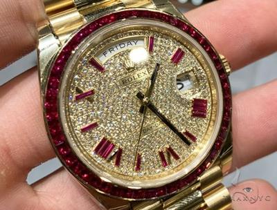 Gold Rolex with rubies and diamonds